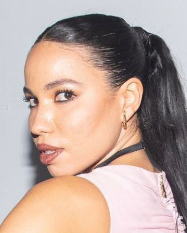 Jurnee Smollett is wearing Hope Huggie Earrings in Gold Vermeil at Versace X Dazed Party