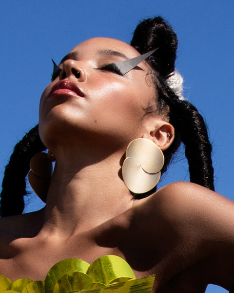 Tinashe is wearing Eucalyptus Earrings Satin Finish, Gold Plated for the September Issue of the Untitled Magazine