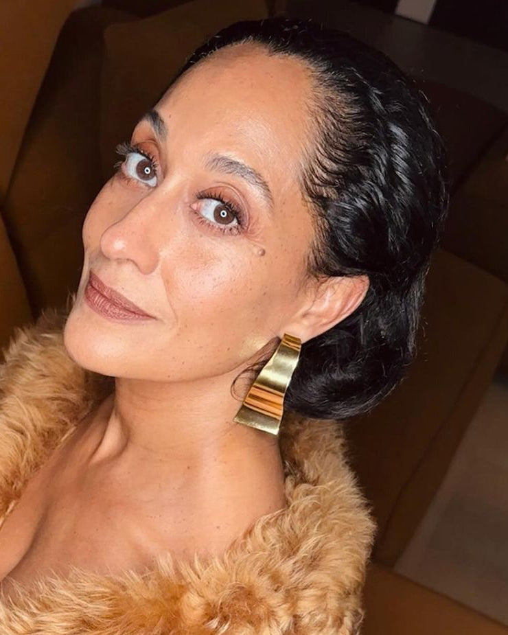 Tracee Ellis Ross  is wearing Wave Earrings, Gold Plated Tracee Ellis Ross / 3rd Annual Fifteen Percent Pledge Gala