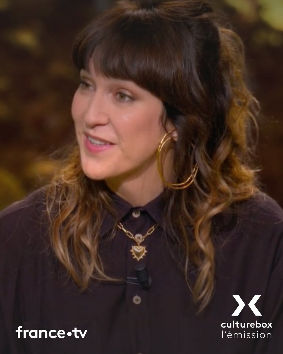 Daphné Bürki is wearing Hope Double Hoop Earrings in Gold Vermeil for Culturebox