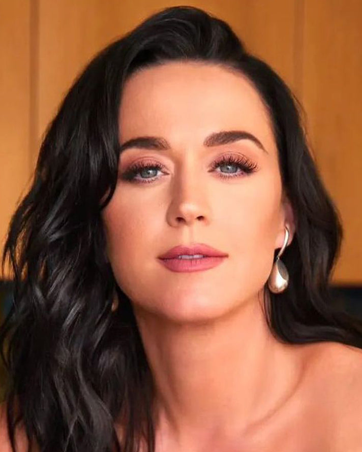 Katy Perry	 is wearing Sense Earrings