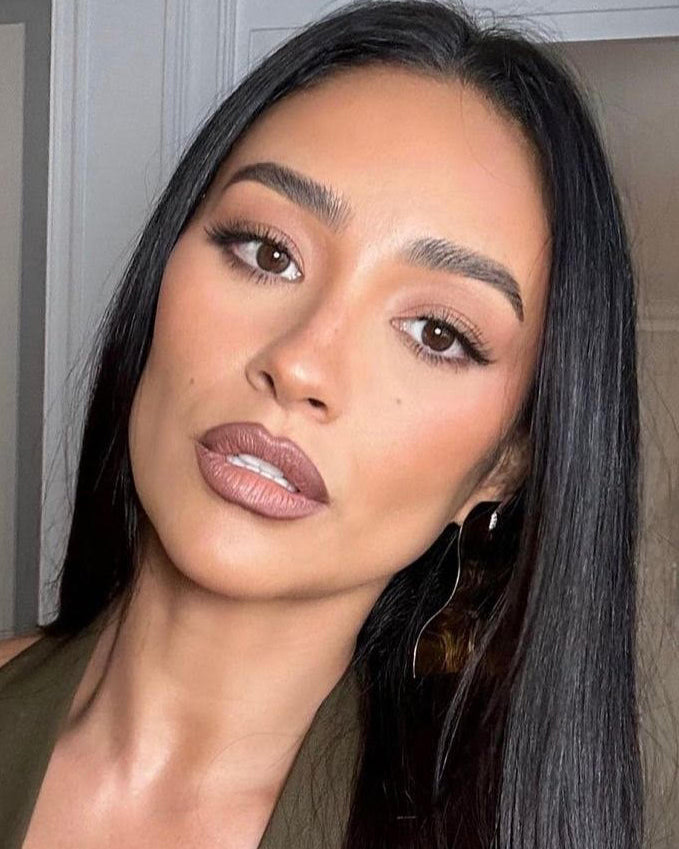 Shay Mitchell  is wearing Wave Earrings, Gold Plated Shay Mitchell during Paris Fashion Week