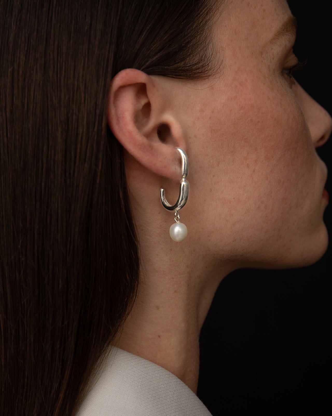 Hope Huggie Earrings With White Pearl Drop – Mara Paris
