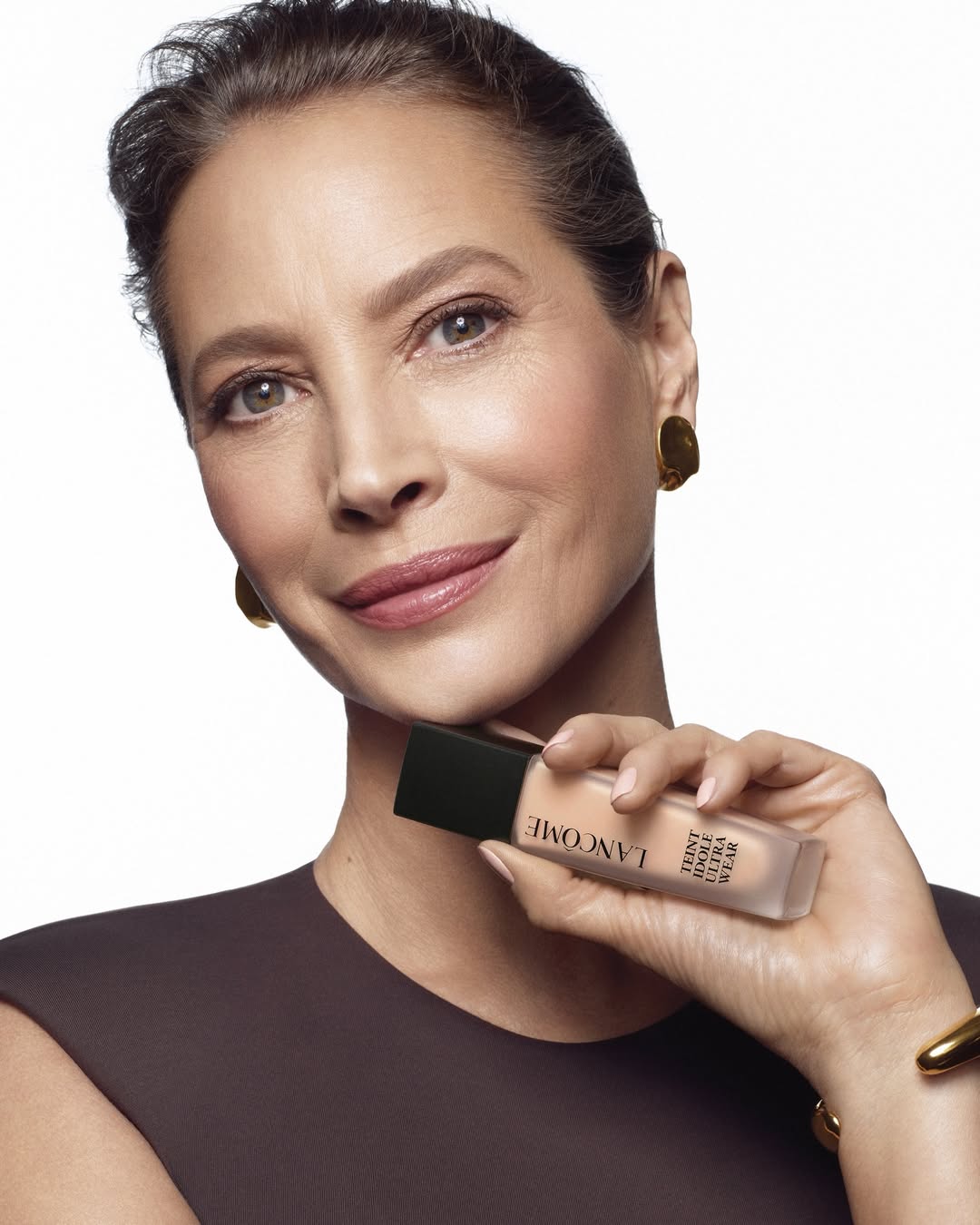 Christy Turlington is wearing Cosmic Earrings and Cosmic Ring