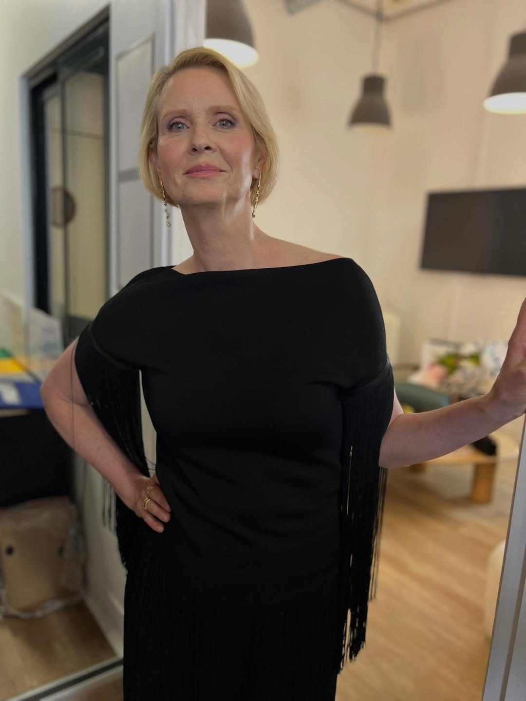 Cynthia Nixon is wearing Flux Ring, Poem Mismatched Earrings and Cosmic Ring