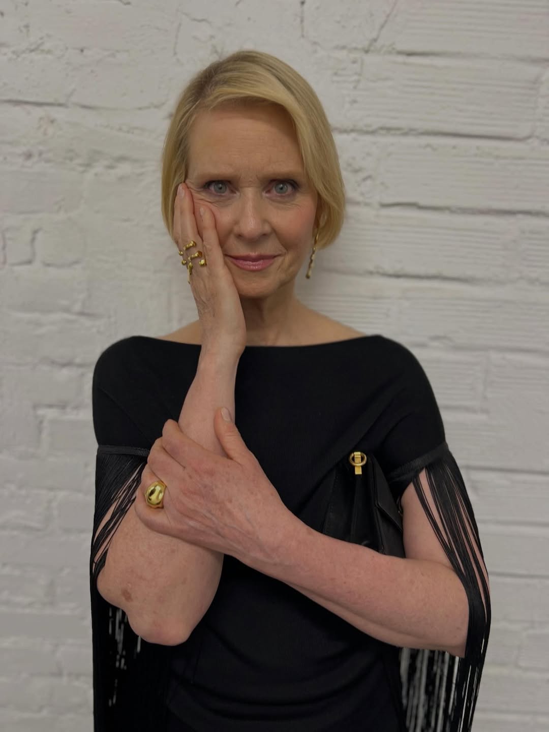 Cynthia Nixon is wearing Flux Ring, Poem Mismatched Earrings and Cosmic Ring