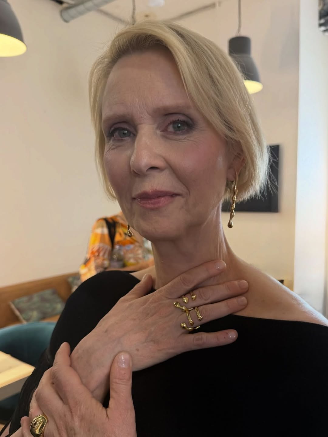 Cynthia Nixon is wearing Flux Ring, Poem Mismatched Earrings and Cosmic Ring