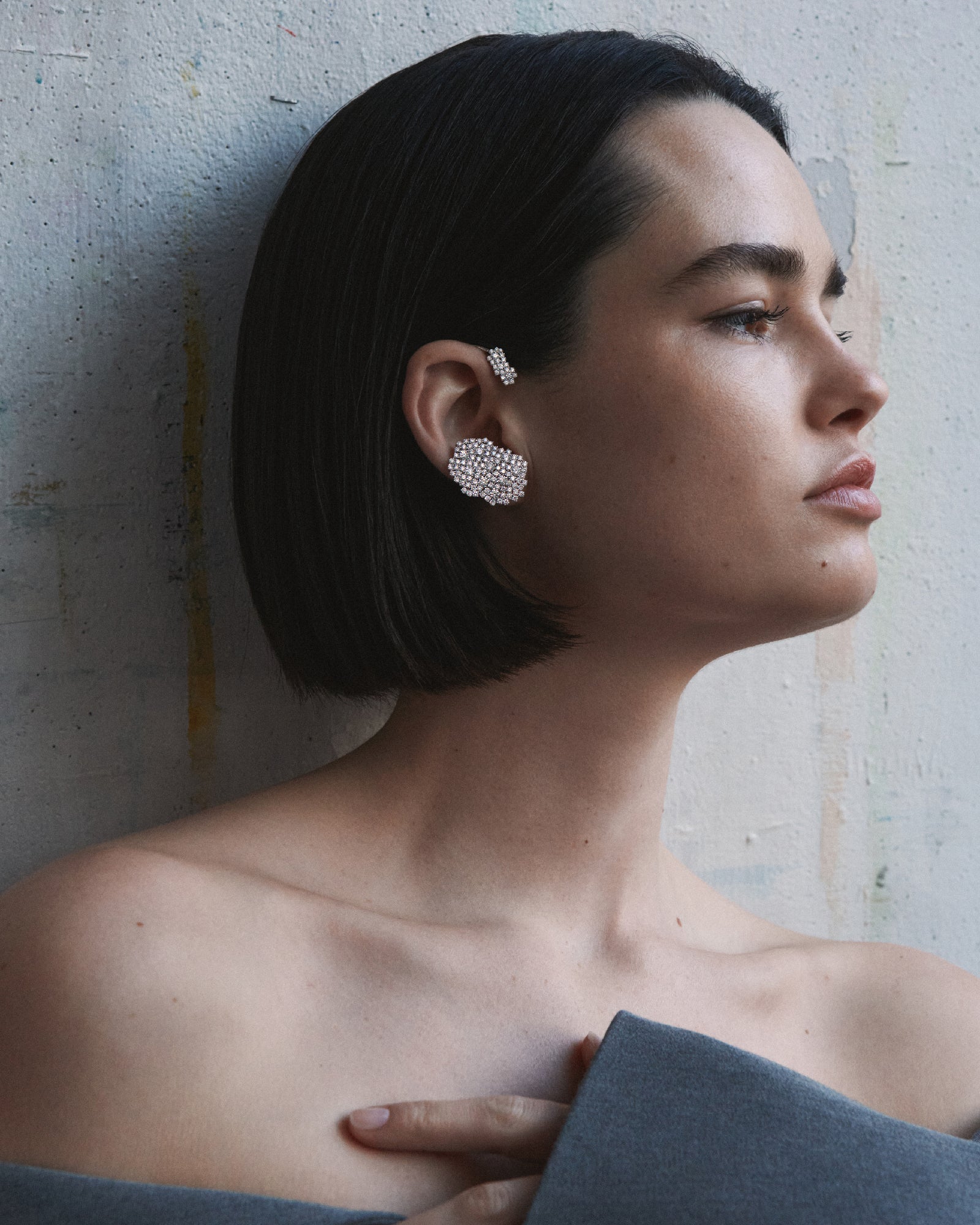 Distinctive white gold diamond ear cuff crafted with a sculptural, modern, and statement-making style