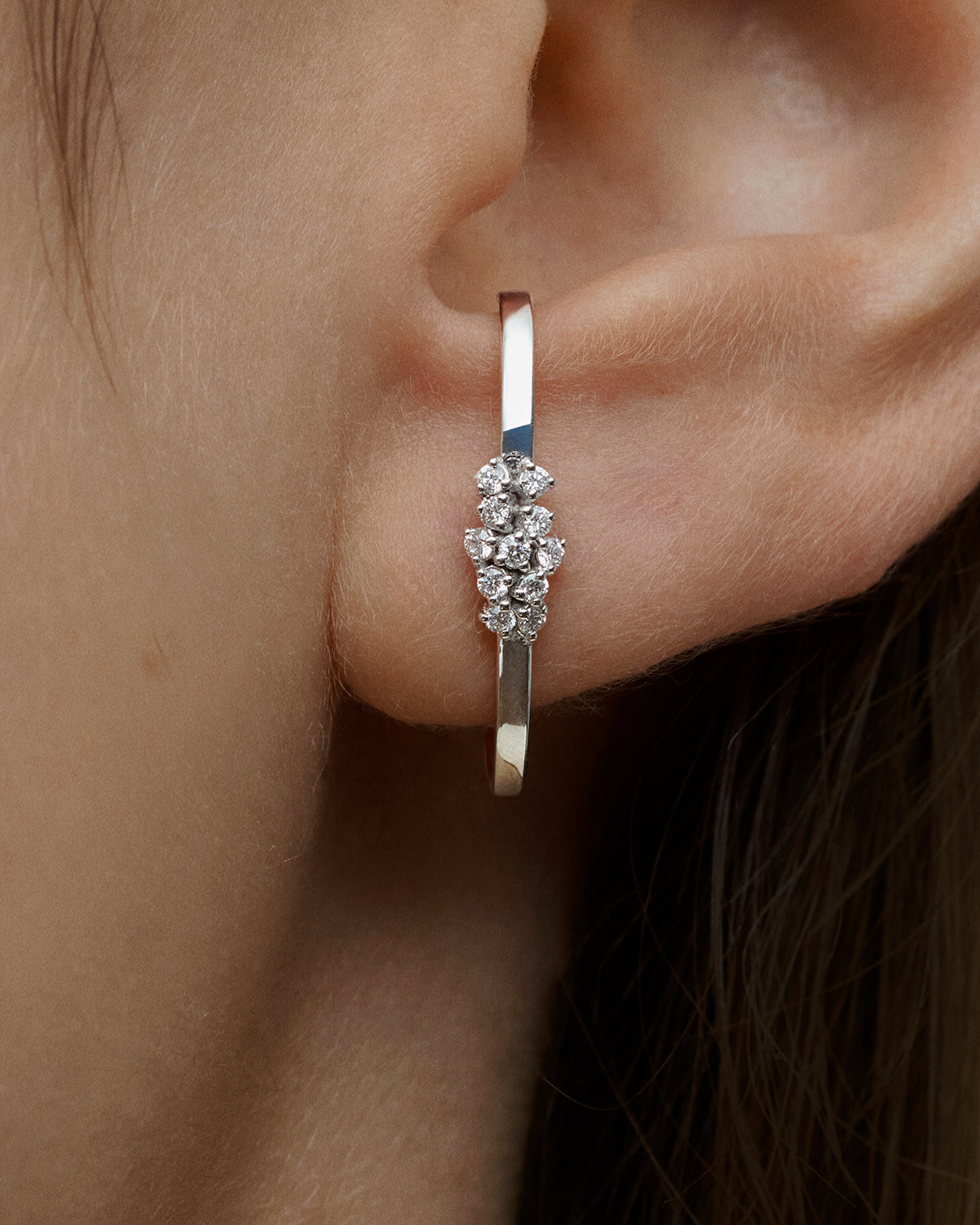 Lyra Huggie Earrings in White Gold