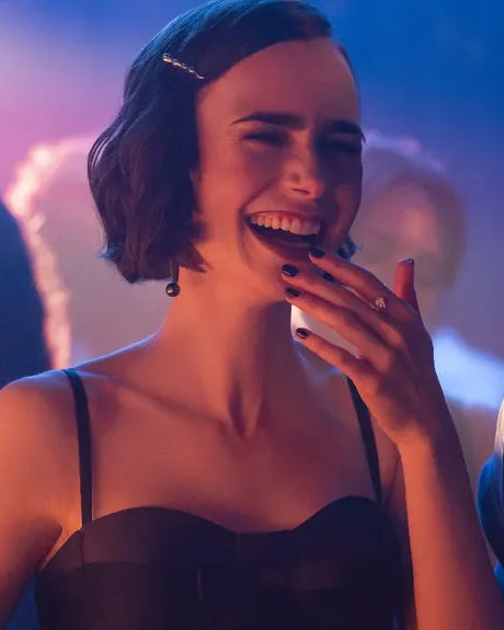 Emily (Lily Collins) laughs while wearing the Poem Hair Clip in Emily in Paris